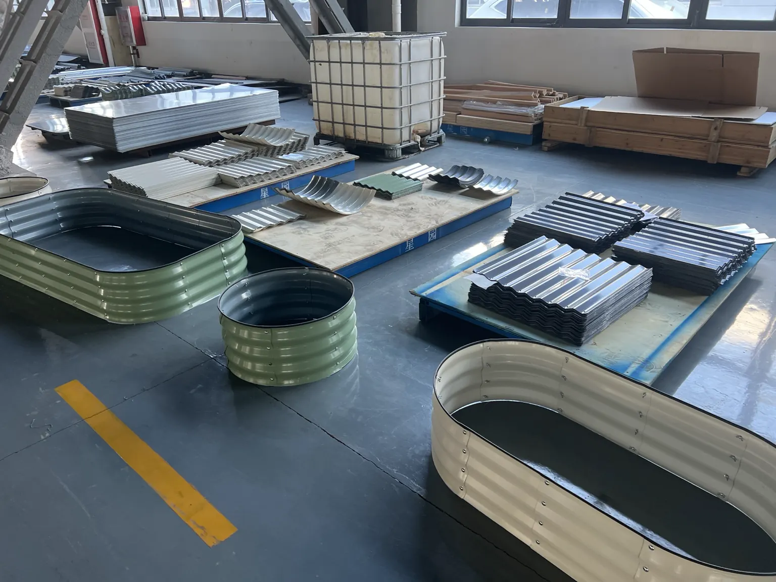 Custom metal raised garden beds and components in YardAve factory