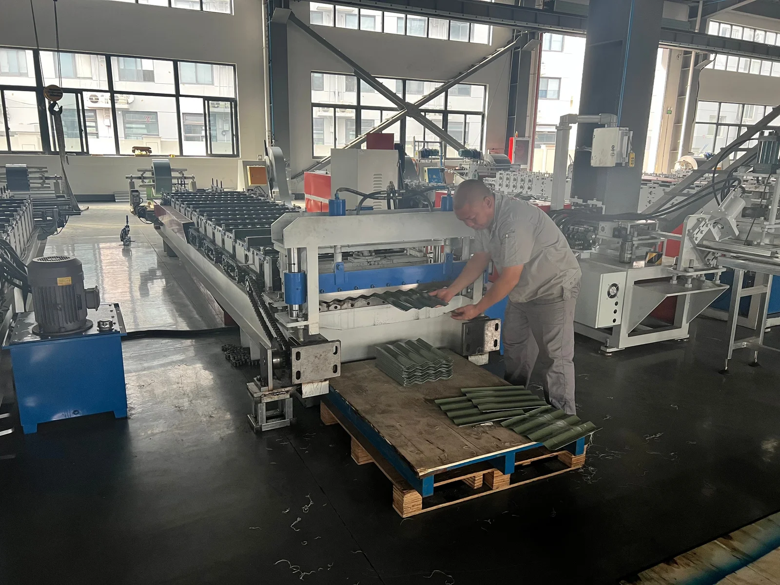 Automated roll-forming and stamping production line for metal raised garden beds at YardAve factory