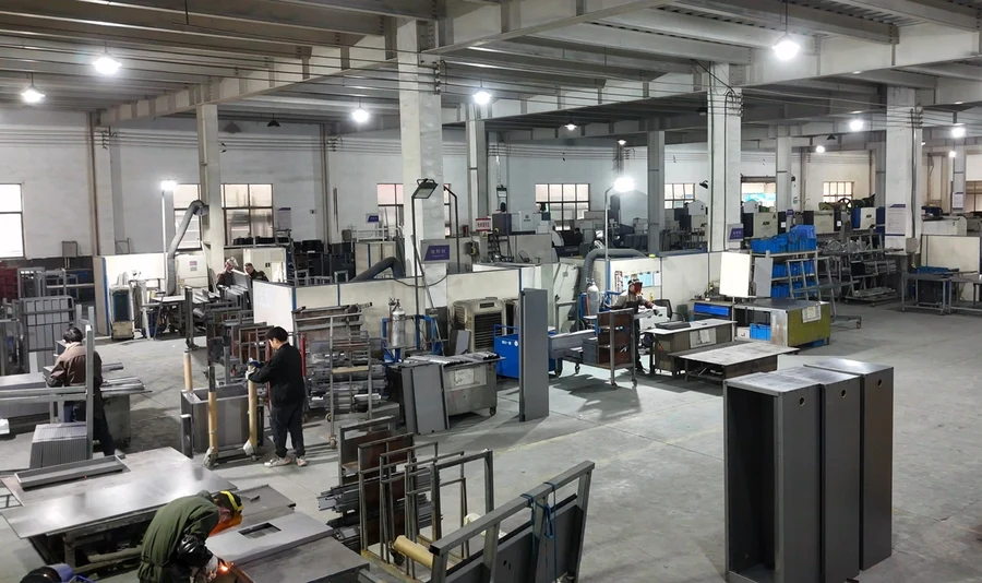 YardAve modern metal fabrication workshop with automated cutting, welding, and assembly lines