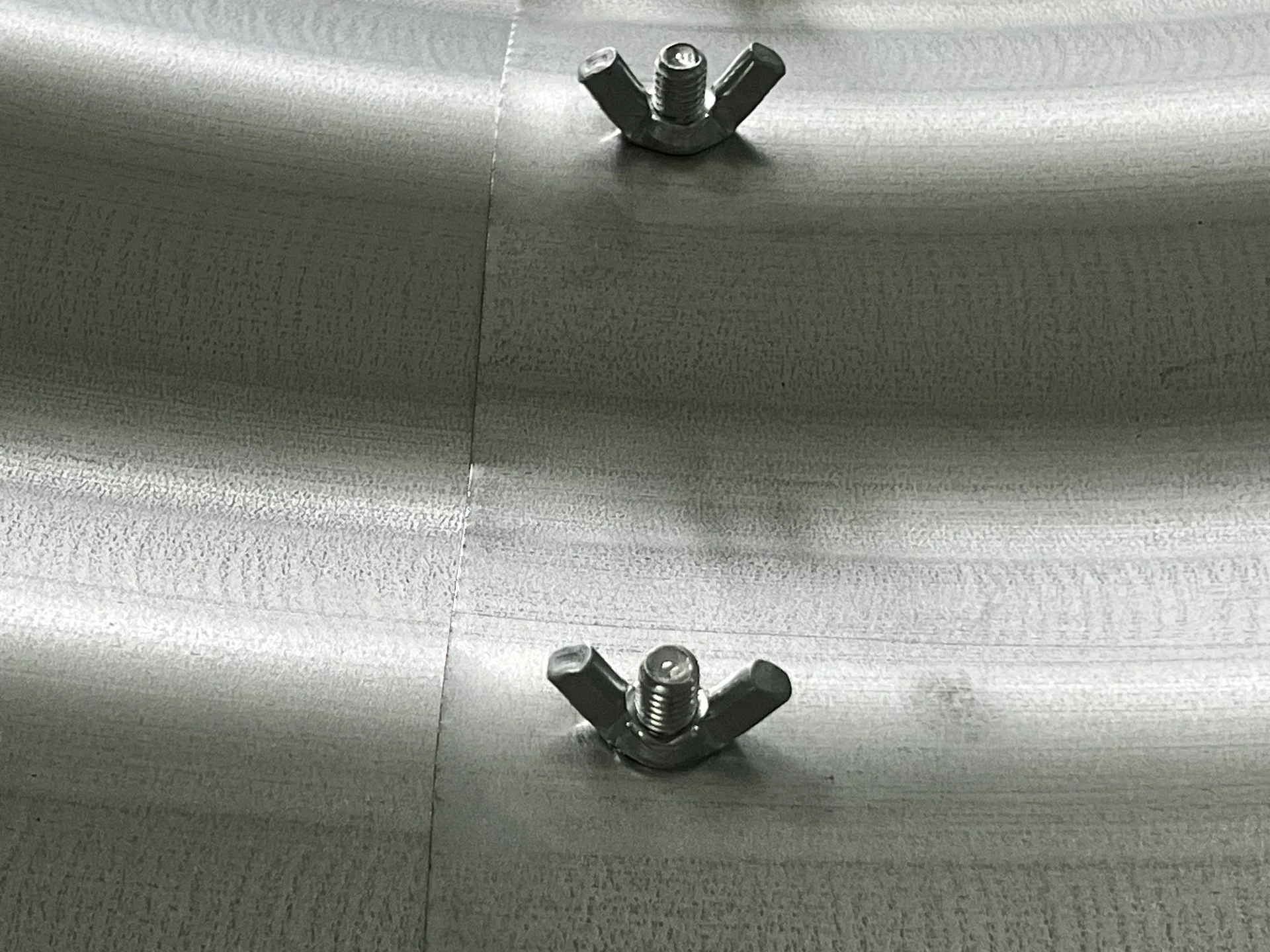 Inside connection of corrugated raised bed panels using bolts and wing nuts